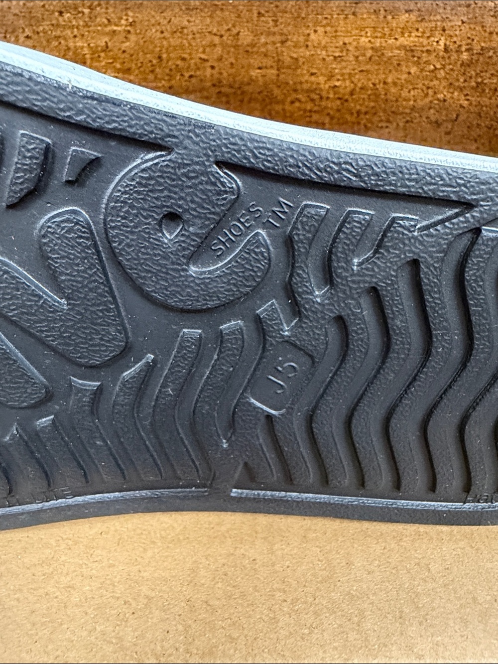 Kids Native Slip-On Perforated Sneakers in Black and White - Picture 3 of 5
